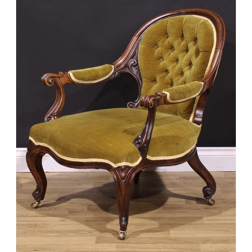 1478 - A Victorian mahogany library chair, stuffed-over upholstery, carved throughout with scrolls and acan... 