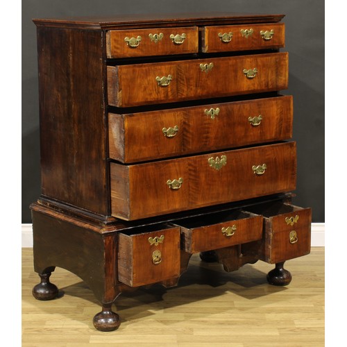 2123 - A Queen Anne/George I walnut chest on stand, moulded top above two short and three long graduated dr... 