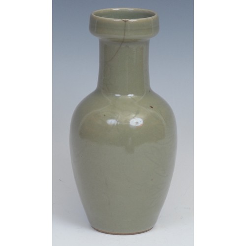 388 - A Chinese celadon ovoid vase, incise moulded with a crane and chrysanthemums, 19.5cm high, blue seal... 