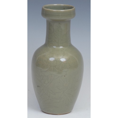 388 - A Chinese celadon ovoid vase, incise moulded with a crane and chrysanthemums, 19.5cm high, blue seal... 