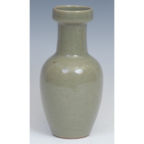 388 - A Chinese celadon ovoid vase, incise moulded with a crane and chrysanthemums, 19.5cm high, blue seal... 