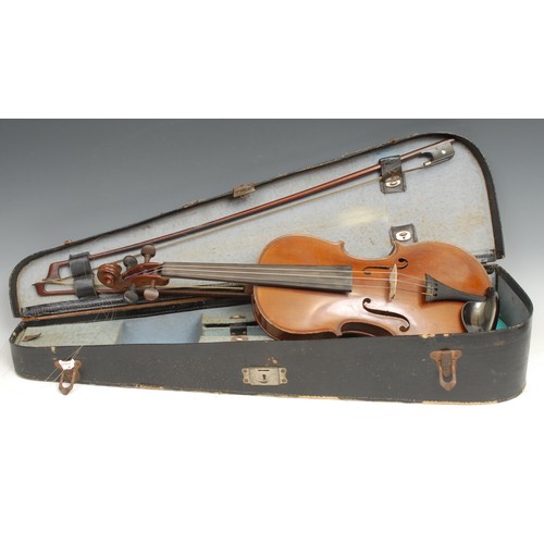 2566 - A violin, the two-piece back 36.5cm long excluding button, paper label printed Nachahmung von Vuilla... 