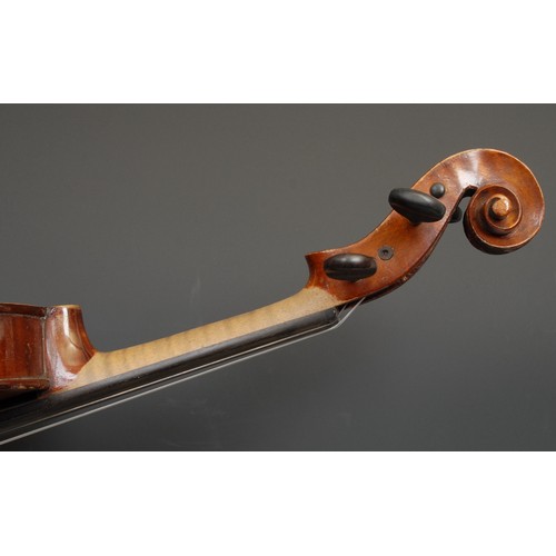 2566 - A violin, the two-piece back 36.5cm long excluding button, paper label printed Nachahmung von Vuilla... 