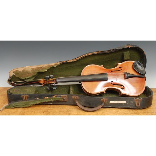 2562 - A violin, the two-piece back 35.75cm long excluding button, ebony tuning pegs, outlined throughout w... 