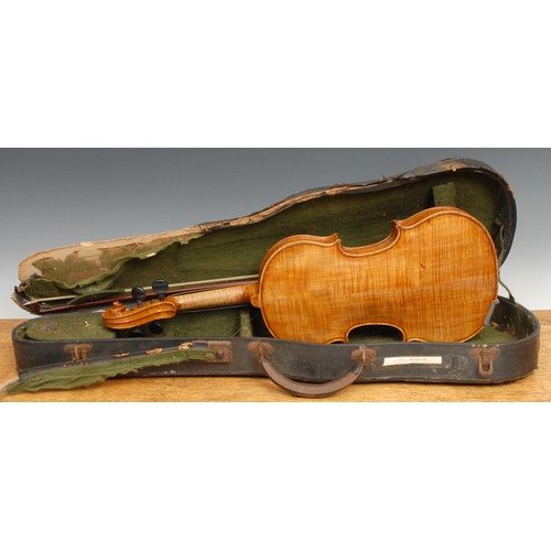 2562 - A violin, the two-piece back 35.75cm long excluding button, ebony tuning pegs, outlined throughout w... 