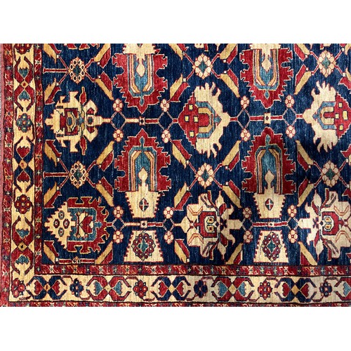 2113 - An Afghan design Shirvan type wool rug or carpet, worked in the traditional manner, 191cm x 139cm