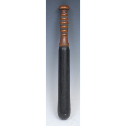 2058 - Police History - a 19th century turned and ebonised truncheon, ribbed grip, 34cm long, c.1870