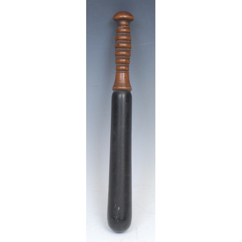 2058 - Police History - a 19th century turned and ebonised truncheon, ribbed grip, 34cm long, c.1870