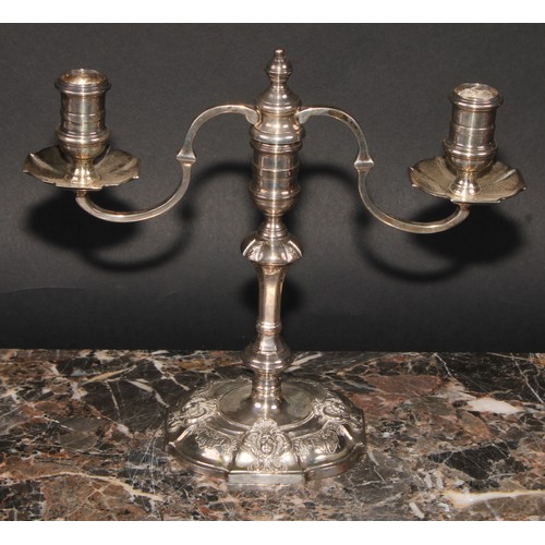 671 - A pair of George III style silver two branch candelabra, Nayler Brothers, London 1959, 1,165g (2)