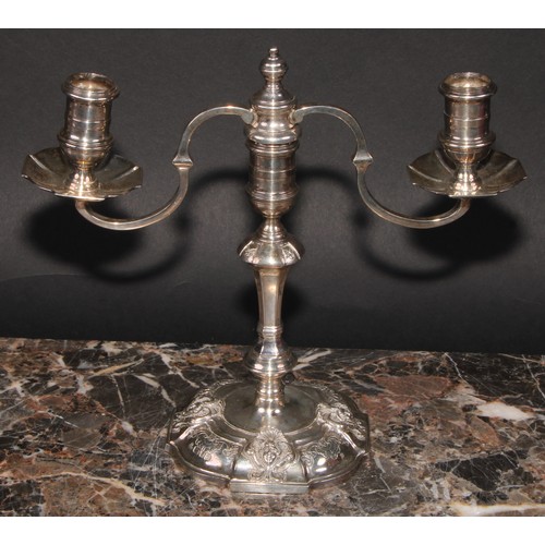 671 - A pair of George III style silver two branch candelabra, Nayler Brothers, London 1959, 1,165g (2)