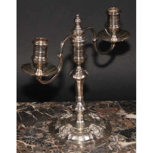 671 - A pair of George III style silver two branch candelabra, Nayler Brothers, London 1959, 1,165g (2)