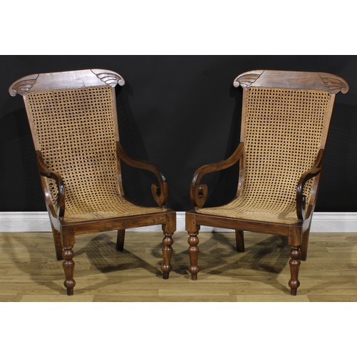 2072 - A pair of 19th century Anglo-Indian plantation chairs, cane seat, turned forelegs, 95.5cm high, 63cm... 