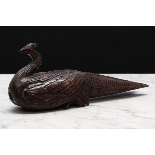 2280 - Nutcrackers - a Black Forest novelty screw-action nut cracker, carved as a bird, 19.5cm long, c.1870