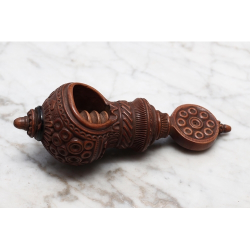 2255 - Nutcrackers - a 19th century Swiss acorn shaped screw-action nut cracker, carved with a band of lotu... 