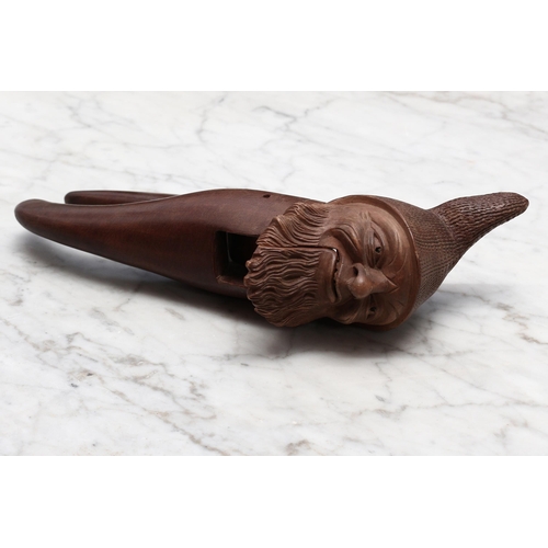 2270 - Nutcrackers - a Black Forest novelty lever-action nut cracker, carved as the head of a bearded gnome... 