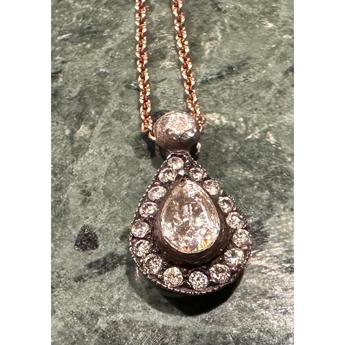 922 - A Victorian pear and round rose cut diamond pendant necklace, central pear diamond surrounded by six... 