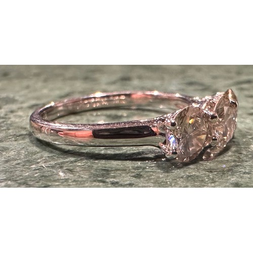 882 - A diamond ring, linear set with three certified round brilliant cut diamonds, total diamond weight, ... 