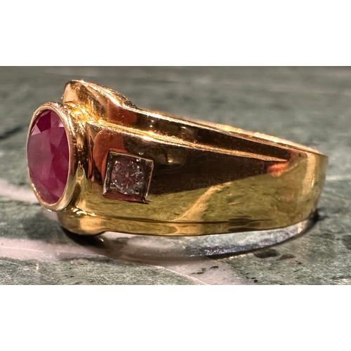 909 - A ruby and diamond ring, central oval rub over set ruby approx 2.80ct, between round brilliant cut d... 