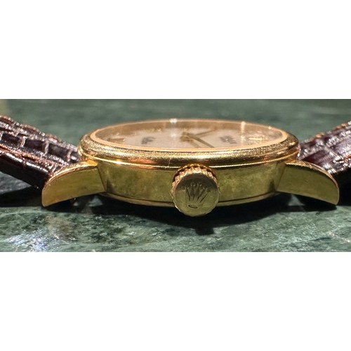 852 - A lady's 18ct gold Rolex Cellini wristwatch, the Champagne dial with Roman numerals, winder with cro... 