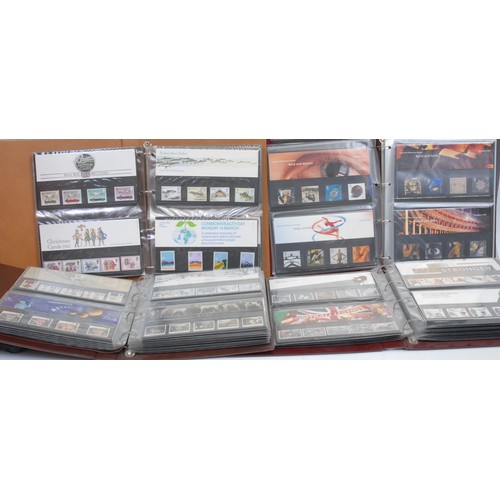 2671 - Stamps - QEII presentation pack collection in four binders, 1980's - 2000, f/v £300+