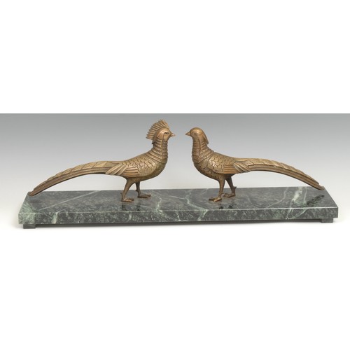 83 - An Art Deco period group, cock and hen pheasants, marble base, 55cm wide