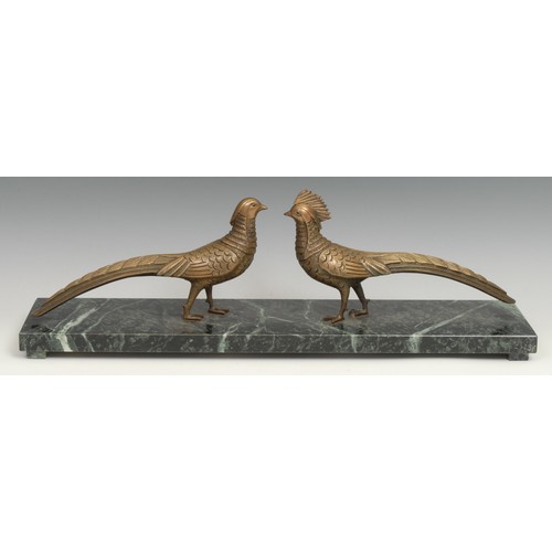 83 - An Art Deco period group, cock and hen pheasants, marble base, 55cm wide