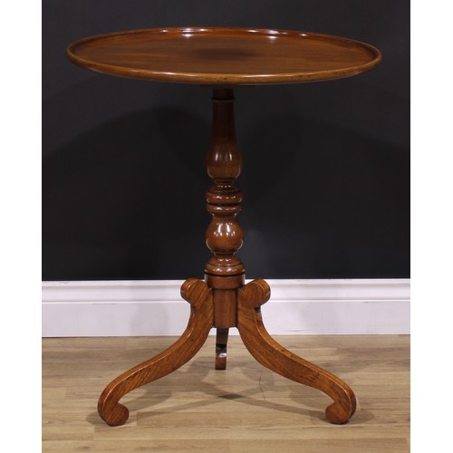 1255 - A 19th century mahogany tripod occasional table, one-piece dished circular top, turned column, scrol... 