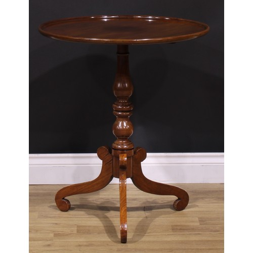 1255 - A 19th century mahogany tripod occasional table, one-piece dished circular top, turned column, scrol... 