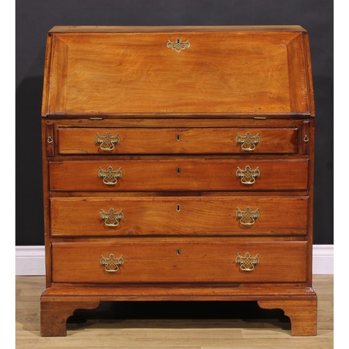 1301 - A George III mahogany bureau, fall front enclosing small drawers and pigeonholes, above four long gr... 