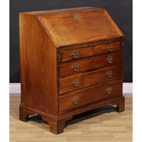 1301 - A George III mahogany bureau, fall front enclosing small drawers and pigeonholes, above four long gr... 