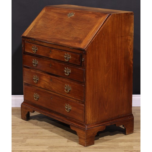 1301 - A George III mahogany bureau, fall front enclosing small drawers and pigeonholes, above four long gr... 