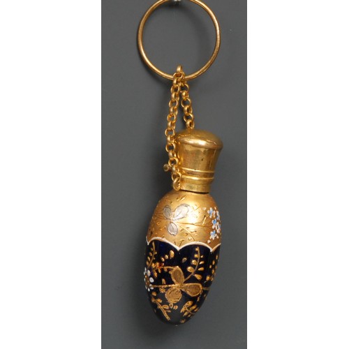 1220 - A 19th century Bohemian blue glass chatelaine scent bottle, gilded and enamelled with stylised flowe... 