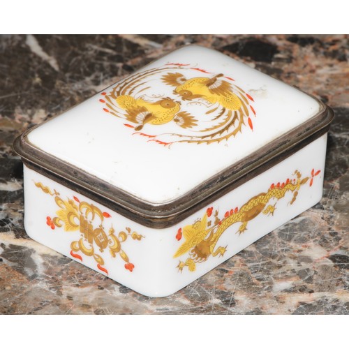 1214 - A 19th century German porcelain rounded rectangular snuff box, hinged cover decorated in yellow, red... 