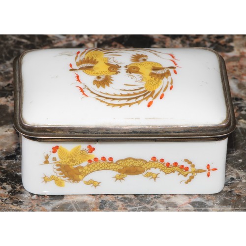 1214 - A 19th century German porcelain rounded rectangular snuff box, hinged cover decorated in yellow, red... 