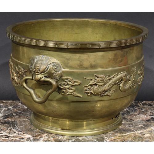 359 - A Chinese gilt bronze censer, cast and applied with a band of dragons and clouds, mask handles to si... 