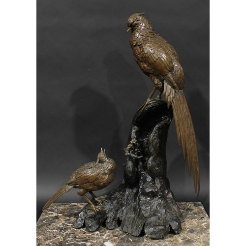 468 - Japanese School (Meiji period), a large brown patinated bronze group, exotic birds perched on a prun... 