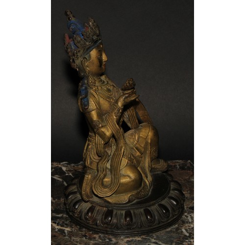 457 - Chinese School (19th century), a gilt and dark patinated bronze, Bodhisattva Tara, kneeling, lotus b... 