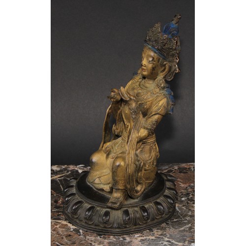 457 - Chinese School (19th century), a gilt and dark patinated bronze, Bodhisattva Tara, kneeling, lotus b... 