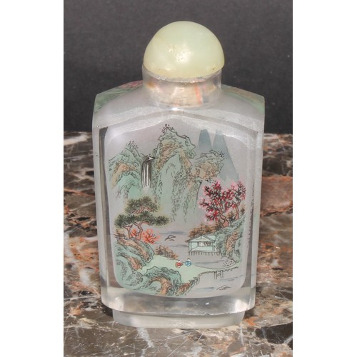 362 - A Chinese inside painted snuff bottle, decorated with a monumental landscape, 7.5cm high