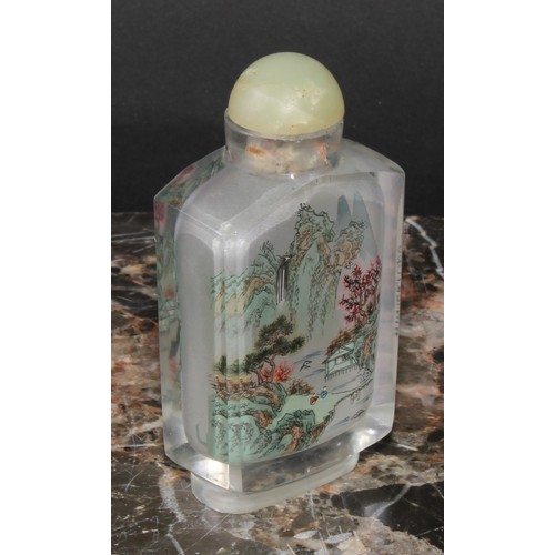 362 - A Chinese inside painted snuff bottle, decorated with a monumental landscape, 7.5cm high