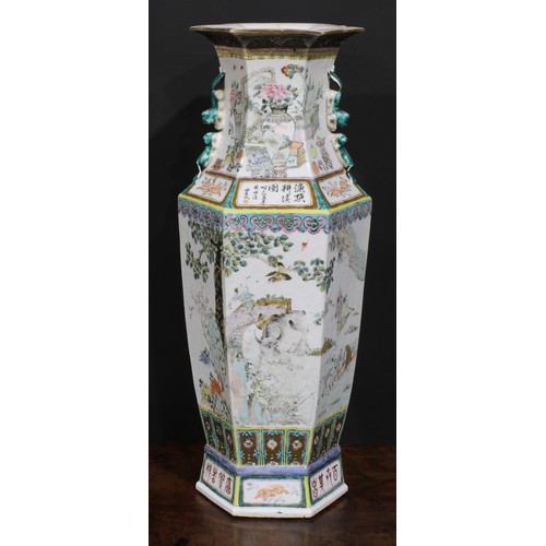 428 - A pair of Chinese hexagonal vases, painted in polychrome with tigers, water buffalo and other animal... 