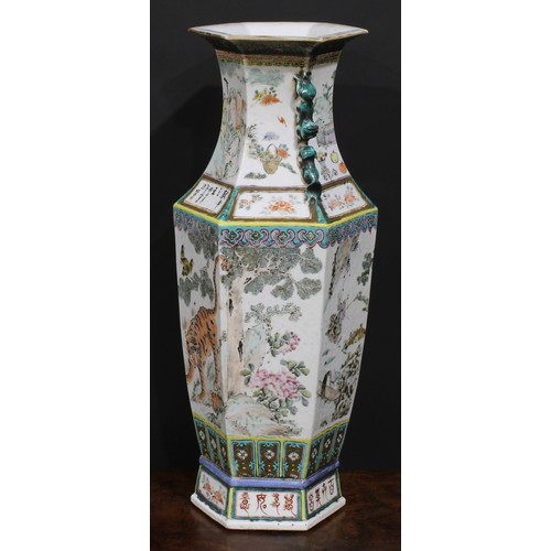 428 - A pair of Chinese hexagonal vases, painted in polychrome with tigers, water buffalo and other animal... 