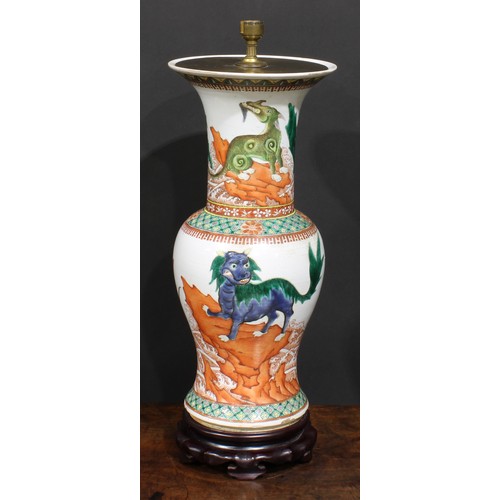 380 - A 19th century Chinese ovoid vase, mounted as a lamp, painted in the famille verte palette with myth... 