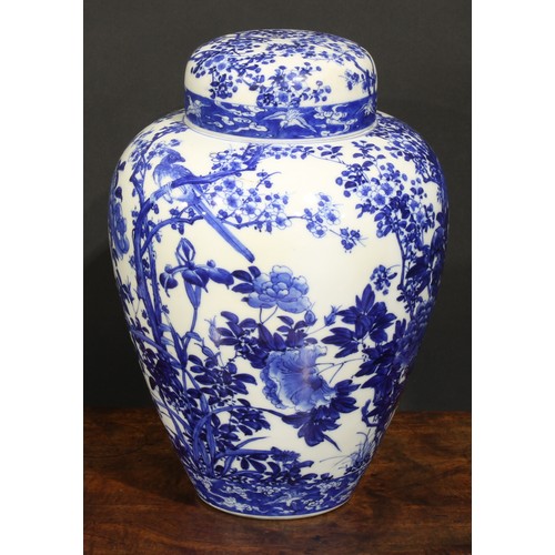 421 - A Japanese porcelain ovoid ginger jar and cover, painted in tones of underglaze blue with the Three ... 