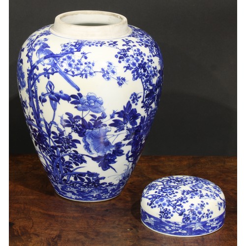 421 - A Japanese porcelain ovoid ginger jar and cover, painted in tones of underglaze blue with the Three ... 