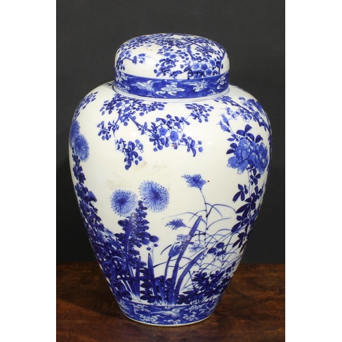 421 - A Japanese porcelain ovoid ginger jar and cover, painted in tones of underglaze blue with the Three ... 