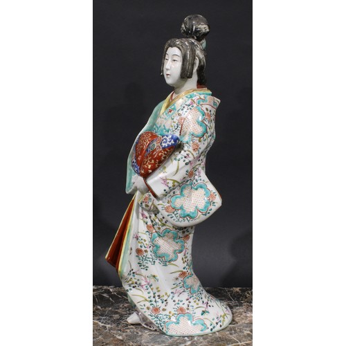 465 - A Japanese porcelain figure, of a lady in a kimono, 46cm high, Meiji period