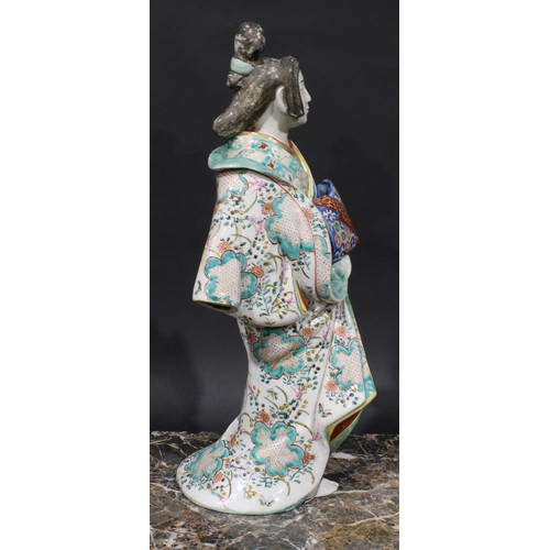 465 - A Japanese porcelain figure, of a lady in a kimono, 46cm high, Meiji period