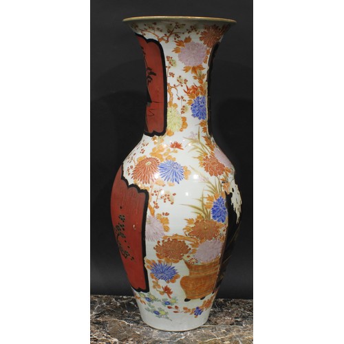 347 - A large Japanese porcelain ovoid vase, decorated with lacquer panels on a ground of flowers and foli... 