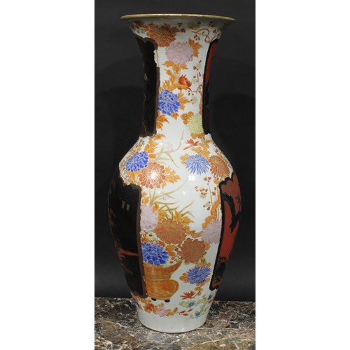 347 - A large Japanese porcelain ovoid vase, decorated with lacquer panels on a ground of flowers and foli... 